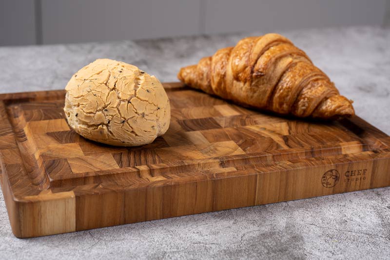 Teak Chef Studio wooden cutting board has unique colors and wood grain but is highly luxurious