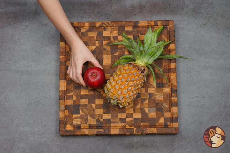 The cutting board has ingenious wood grain, perfect for cutting, slicing, and arranging food